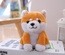 Muñeco parlante eléctrico de Pomerania y Shiba Inu