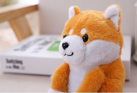 Muñeco parlante eléctrico de Pomerania y Shiba Inu