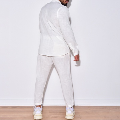 Conjunto de dos piezas casual para hombre: suéter de manga larga con cuello en V y pantalón recto, color sólido, para uso diario.
