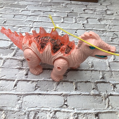 Dinosaurio bailarín con luces y música