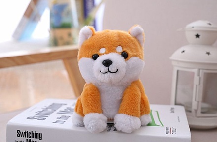 Muñeco parlante eléctrico de Pomerania y Shiba Inu