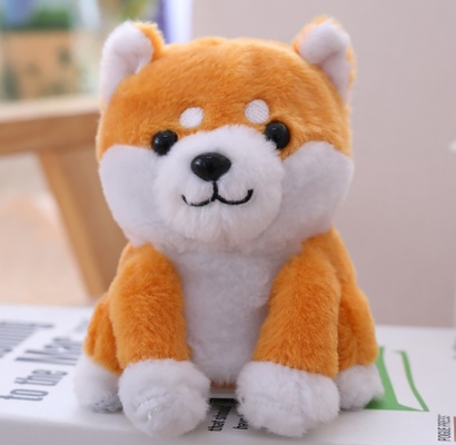 Muñeco parlante eléctrico de Pomerania y Shiba Inu