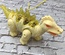 Dinosaurio bailarín con luces y música