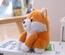 Muñeco parlante eléctrico de Pomerania y Shiba Inu