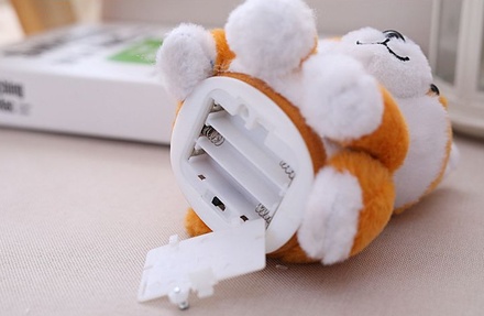 Muñeco parlante eléctrico de Pomerania y Shiba Inu