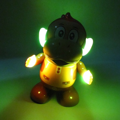 Juguete de mono bailarín con luces y música eléctrica