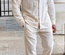 Conjunto de dos piezas casual para hombre: suéter de manga larga con cuello en V y pantalón recto, color sólido, para uso diario.