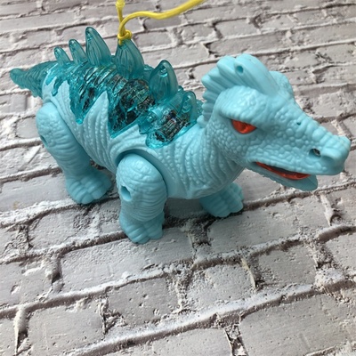 Dinosaurio bailarín con luces y música